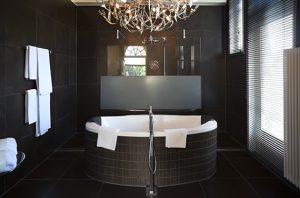 A bathroom's lighting can make or break the space.