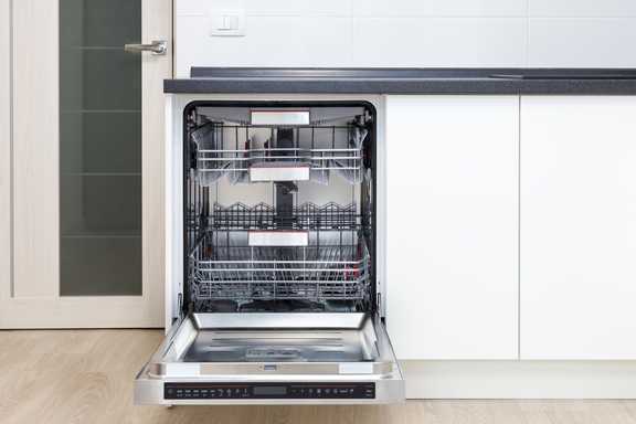 Empty dishwasher in modern home. 