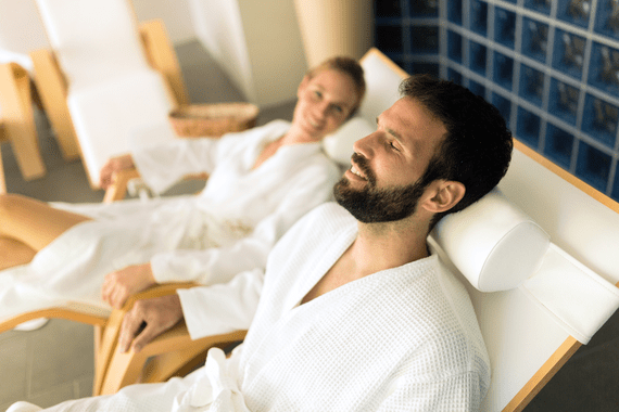 couple enjoying a relaxing spa during staycation
