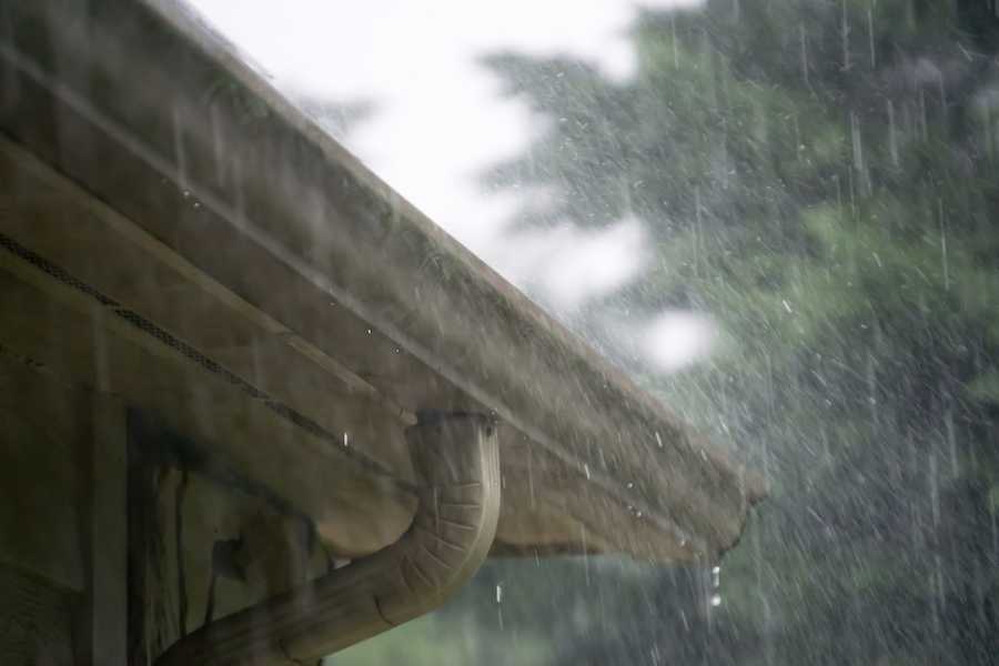 Heavy rain pouring into gutters in Atlanta