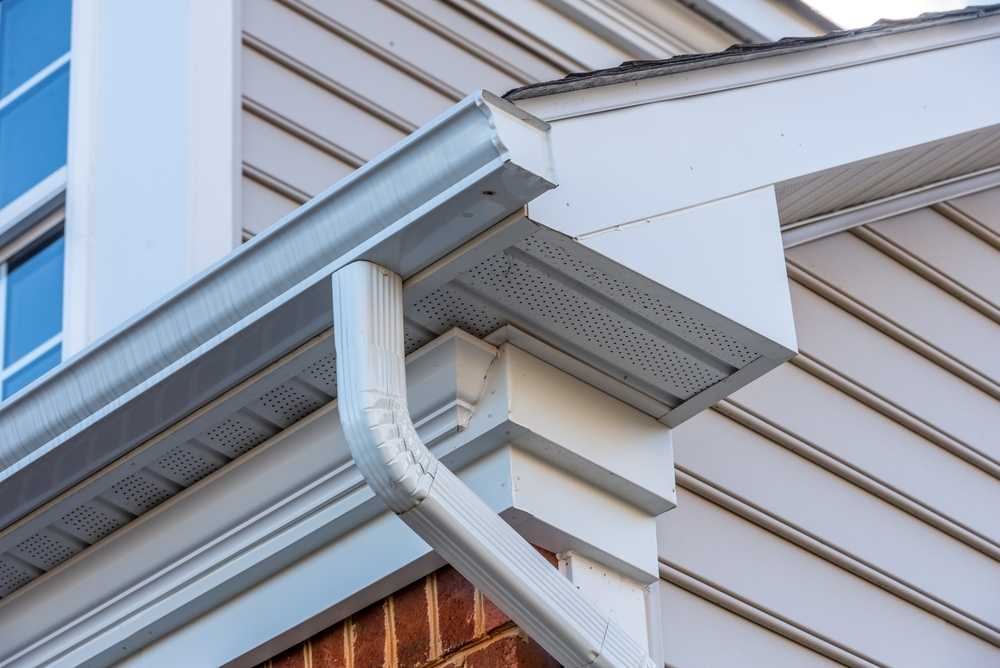 How Far Should Gutters Extend Past Your Roof?